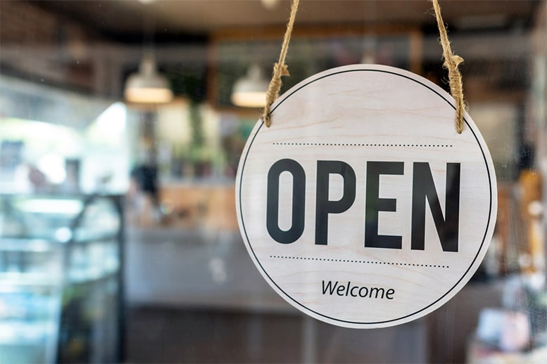 open sign on small business door